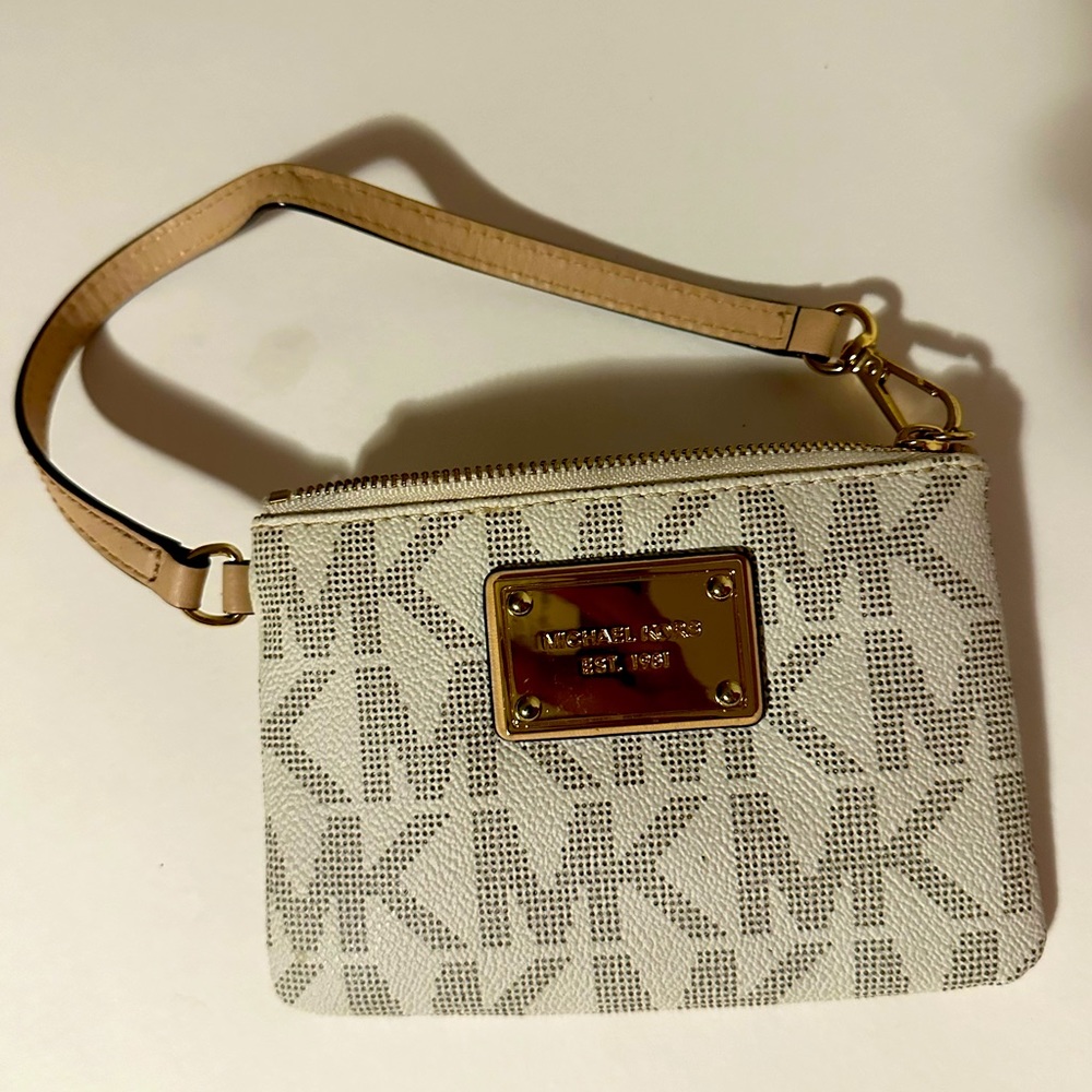 Michael Kors, leather wristlet; Brand new/no tags stylish,lightweight, durable